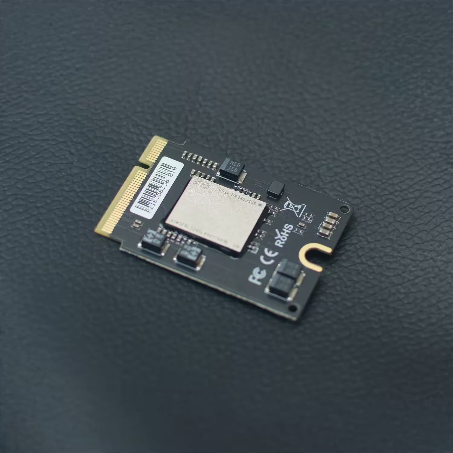 Computer hardware component on a dark textured surface