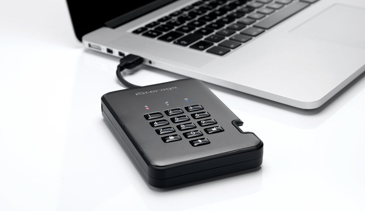 iStorage diskAshur PRO2 SSD — connected to laptop